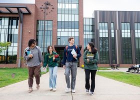 Students walk through campus.