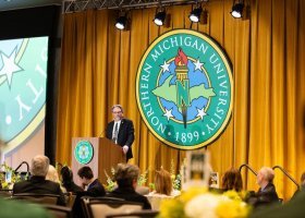 NMU President Chris Olsen gives an address during his Investiture ceremony.