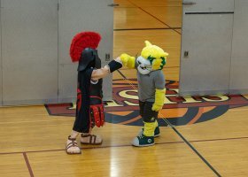 Sully the Sentinel and Wildcat Willy fist bump
