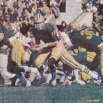 NMU quarterback Steve Mariucci hands off to running back Randy Awrey for the game-winning touchdown run against Western Kentucky in the DII championship