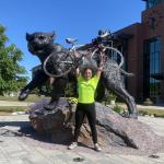 Stypulkowska in front of the Wildcat statue on campus