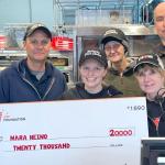 Heino (front center) with KFC team members in Marquette.