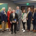 Interim Provost and VP for Academic Affairs Dale Kapla received a special recognition from the board for his service. He is pictured front and center with (back row from left): Trustees Steve Lindberg, Alexis Hart, Greg Toutant, Missie Holmquist, Greg Seppanen and Lisa Fittante, NMU President Brock Tessman, and Trustees Brigitte LaPointe-Dunham and Steve Young.