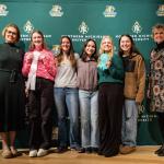 Third place group division (from left): Provost Anne Dahlman, Megan Wells, Faculty Adviser Amber LaCrosse, Lily Briggs, Isabella Enger, Jayme Pomper, and Dean Lisa Schade Eckert.