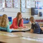 Early education teacher with students (NMU stock photo)