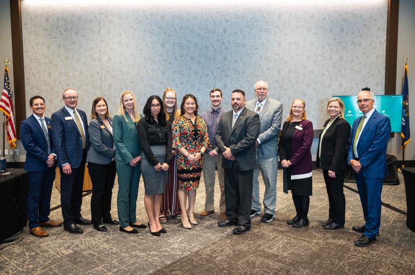 (From left): Trustee Jason Morgan, Chair Steve Young, Trustees Lisa Fittante and Missie Holmquist, BOT award winners Chavez-Rhoades, Gage, Line, Lippert and Goss, Trustees Greg Seppanen and Tami Seavoy, Vice Chair Alexis Hart and Trustee Robert Mahaney