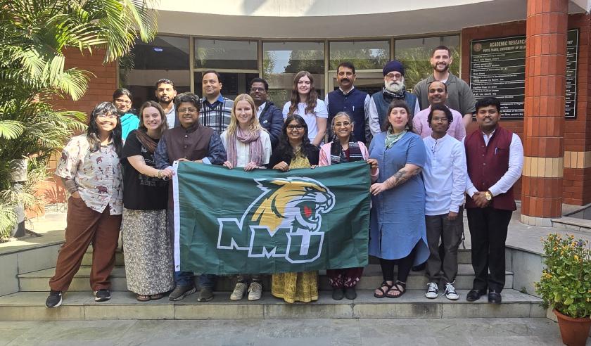 The NMU delegation with hosts in India