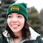 NMU student Brianna Sartin sporting a beanie with the new name